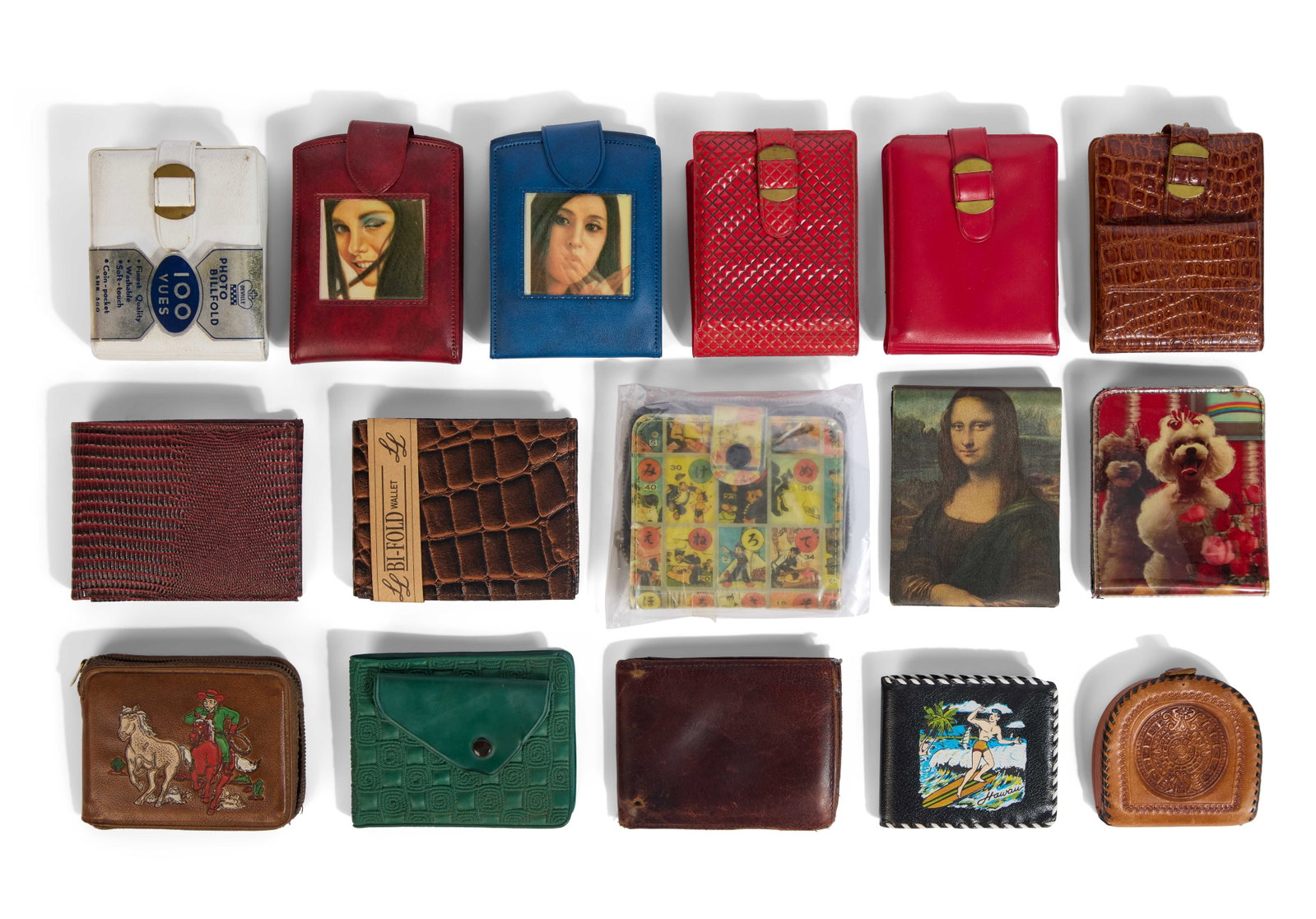 Paul Reubens | Wallet Collection (16): A collection of sixteen wallets personally owned by Paul Reubens, including a Mona Lisa wallet, a Hawaii surfing wallet, an Astro Boy wallet, a Poodle wallet, two wallets by LL, a white Deville photo 
