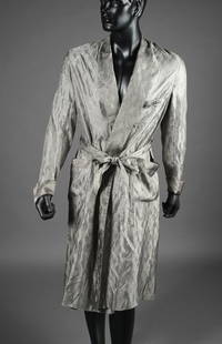 PLAYBOY: Hugh Hefner Signed Robe: Personal Collection Custom grey silk/rayon robe, signed boldly at top right breast pocket ("Hugh Hefner"), lightly brocaded with diamond motif, lapel collar extending to waist, front breast pocket, 