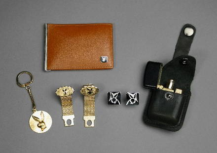 Vintage PLAYBOY Jewelry: Comprised of five customized vintage Playboy merchandising items, including a brown leather billfold, featuring metal Rabbit Head Logo on exterior, designed for Playboy by Dopp Leather Goods, silver