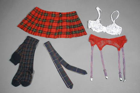 PLAYBOY Lauren Anderson Worn Ensemble: Playmate, July 2002 Five piece custom ensemble, including a short plaid wool miniskirt, a white lace synthetic blend bra, wool plaid tie, cotton plaid leggings, set of red lace and elastic garters,