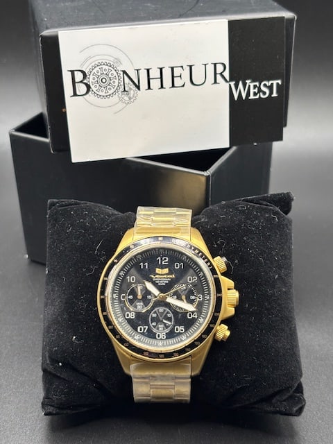 Vestal Unisex ZR-@ Watch: New in box un-used watch with black face and gold tone bezel and bracelet. This watch is un-tested. See photos for details and condition.