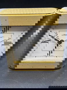 Tiffany & Co Rectangular Desk Clock: Tiffany & Co tilting desk clock, see photos for condition and details. Clock is missing a screw to back plate, untested item.