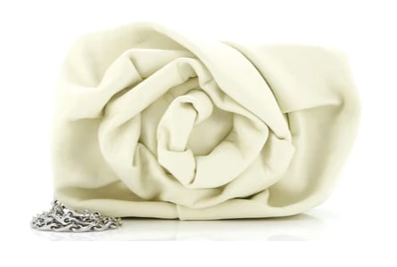 Burberry Rose Clutch with Chain: Turn heads with this stunning statement clutch, artfully designed to resemble a blooming rose. Crafted from soft ivory leather, the sculpted folds create a luxurious floral silhouette. The detachable