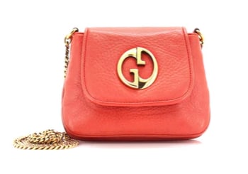 Gucci Vintage Coral Crossbody Purse: Gucci Soho Small Leather Shoulder Bag in Coral Red The Gucci Soho Small Shoulder Bag in coral red leather is a chic and vibrant accessory that adds a pop of color to any outfit. Crafted from soft pebb
