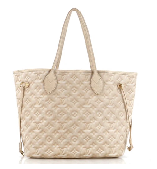 Louis Vuitton Neverfull NM Tote Stardust Monogram Empreinte Leather MM: Louis Vuitton Neverfull MM Tote – Cream Monogram Empreinte Leather Experience luxury and everyday practicality with this Louis Vuitton Neverfull MM Tote. Crafted from Monogram Empreinte leather in a