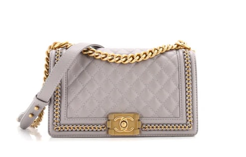 Chanel Boy Flap Bag Quilted Caviar with Whipstitch Chain Detail Old Medium: Chanel Boy Bag – Gray Quilted Leather with Gold Hardware Elevate your collection with this stunning Chanel Boy Bag. Crafted from soft gray quilted leather, this iconic design is accented with antiqu