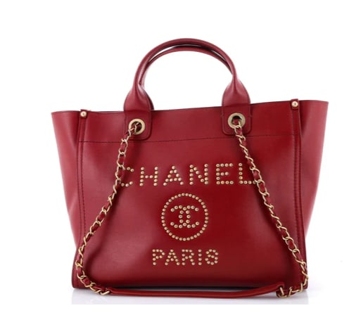 Chanel Deauville Tote Studded Caviar Small: Chanel Large Studded Deauville Tote – Red Calfskin Leather Make a bold fashion statement with this Chanel Large Studded Deauville Tote. Crafted from luxurious red calfskin leather, this spacious