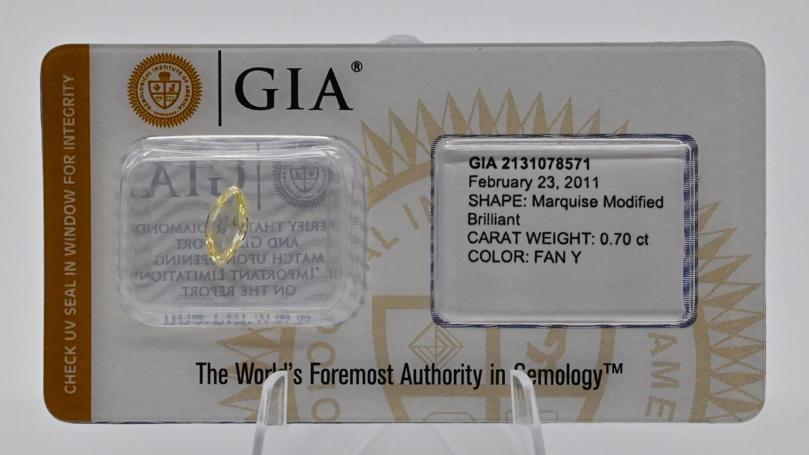 Loser Diamant, Marquise, 0,70 ct Fancy Yellow, eingeschweißt, mit Zertifikat: Loser Diamant, Marquise, 0,70 ct Natural Fancy Yellow, 9,25 × 4,53 × 2,15 mm, mit GIA-Expertise, versiegelt. 