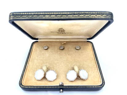 Art Deco Larter & Sons Platinum Gold Mother of Pearl Cufflinks Set: Art Deco Larter & Sons Platinum Gold Mother of Pearl Cufflinks Set This exquisite Art Deco dress set features cufflinks and three studs crafted from platinum, 14K gold, and mother of pearl. Each cuffl