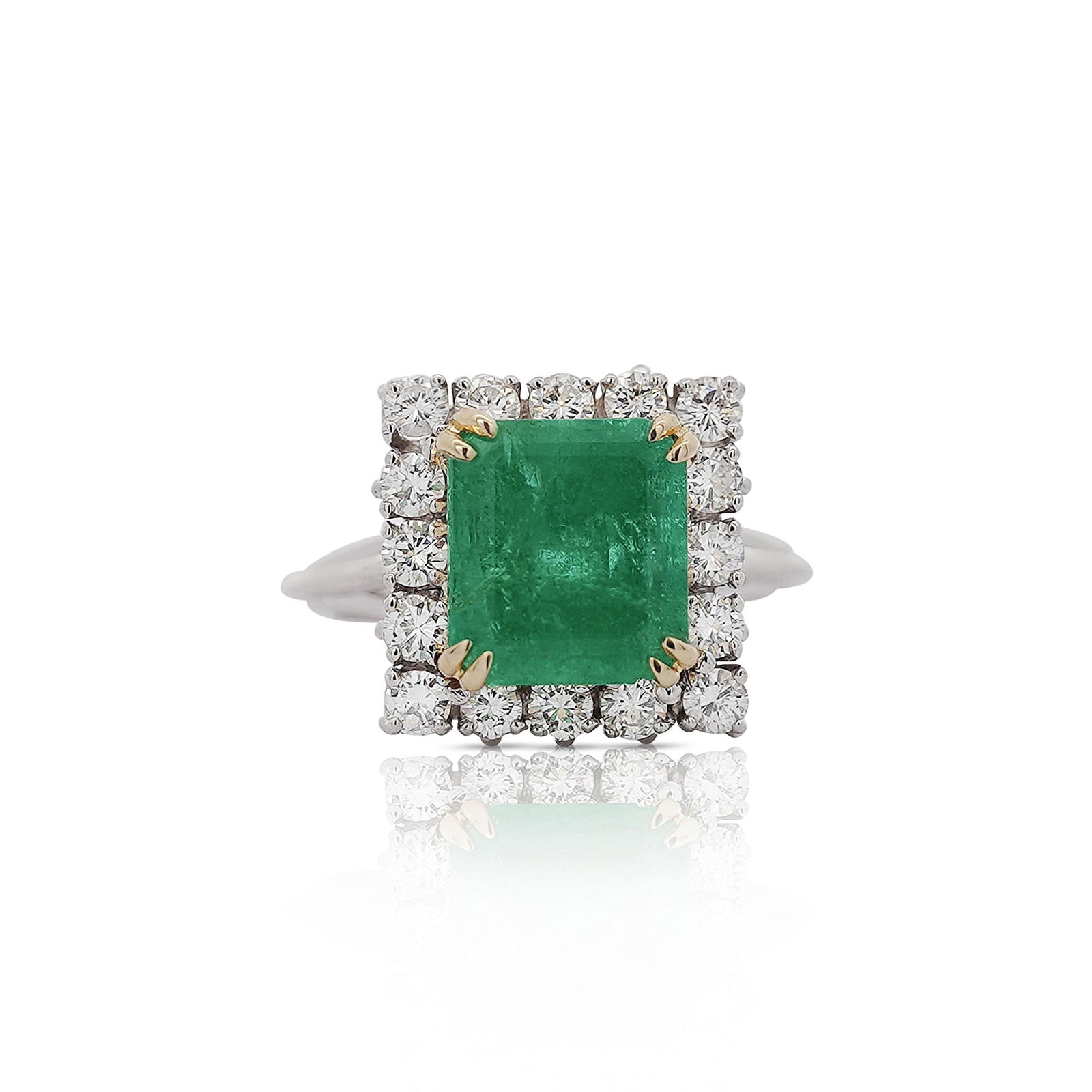 2.97 Carat Emerald Cut Emerald Diamond Halo 18K White Gold Ring: 2.97 Carat Emerald Cut Emerald Diamond Halo 18K White Gold Ring This exquisite vintage-style statement ring features a stunning 2.97-carat square emerald at its center, showcasing a deep green hue. Th