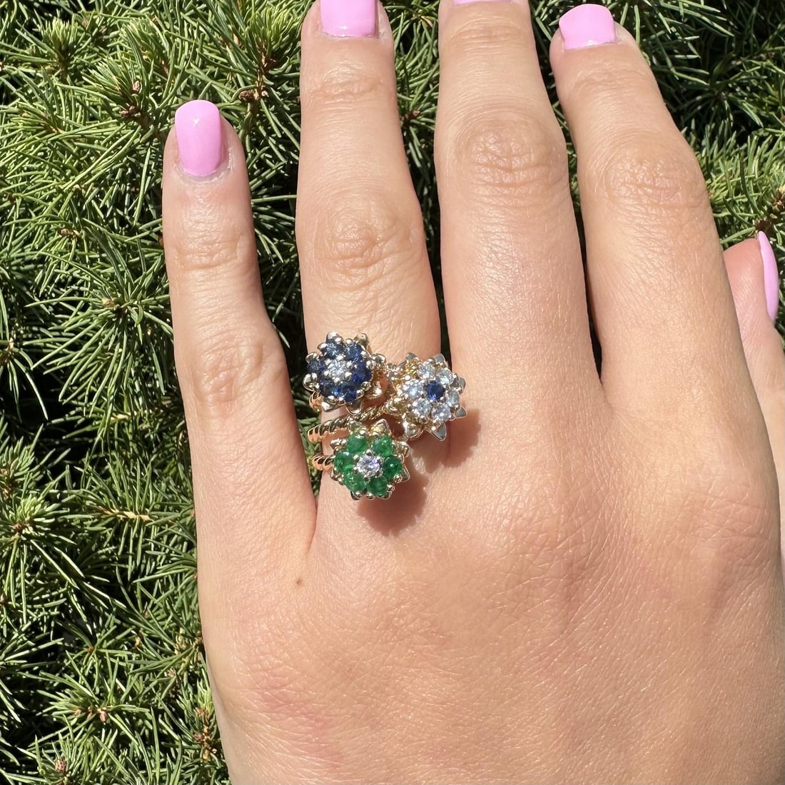 Stackable Solid Gold Tulip Ring Set with Emerald Sapphire Diamond: Stackable Solid Gold Tulip Ring Set with Emerald Sapphire Diamond This exquisite set of three stackable rings features a high-profile tulip flower design, crafted from 13k - 14k yellow gold. Each ring