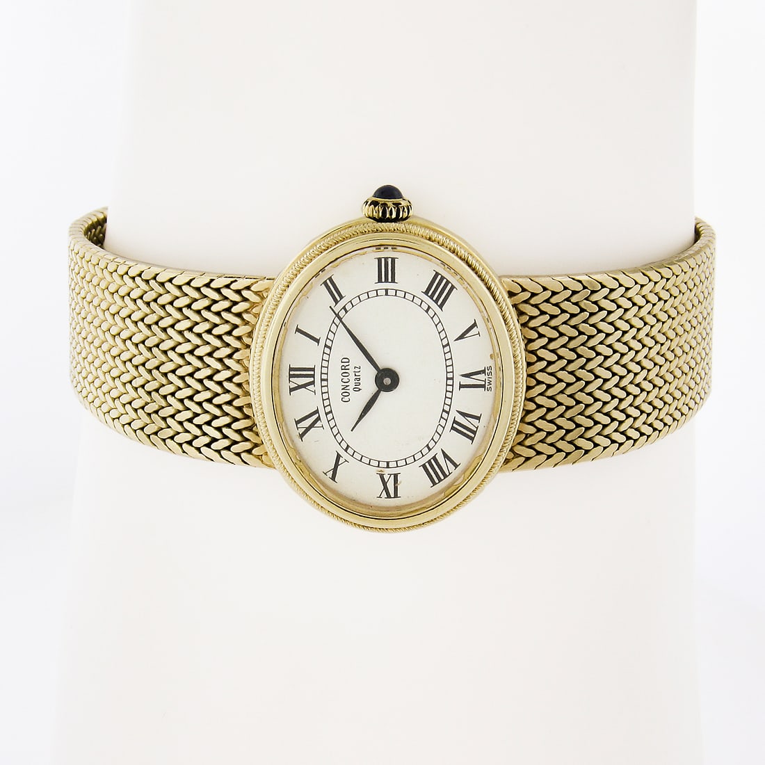 Ladies 14k Yellow Gold Concord 26mm Oval Watch with Mesh Bracelet: Ladies 14k Yellow Gold Concord 26mm Oval Watch with Mesh Bracelet This exquisite Ladies 14k Yellow Gold Concord Watch features a stunning oval shape and a luxurious mesh braided link bracelet. With a