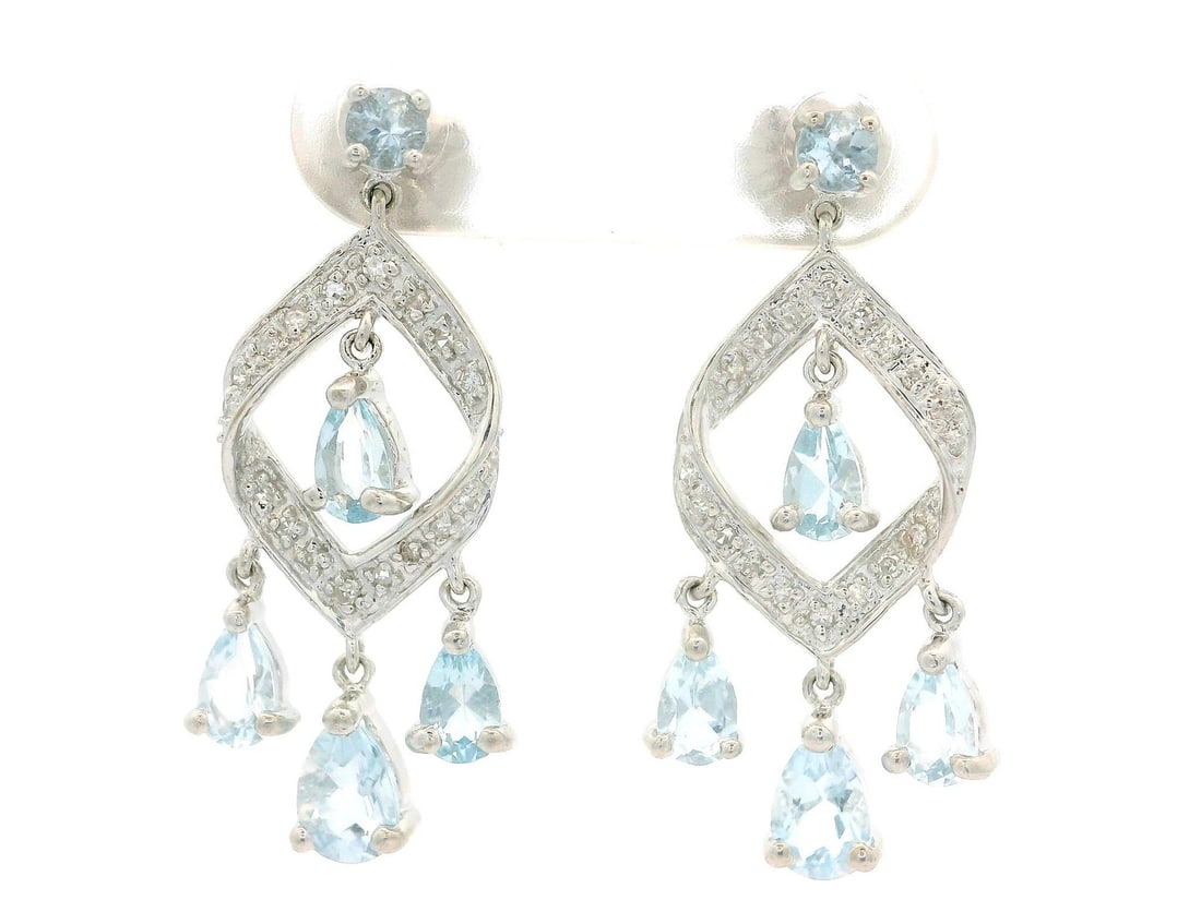 14k White Gold Aquamarine Diamond Chandelier Earrings: 14k White Gold Aquamarine Diamond Chandelier Earrings Elevate your elegance with these stunning 14k White Gold Aquamarine and Diamond Dangle Drop Chandelier Earrings. Featuring a captivating design, t