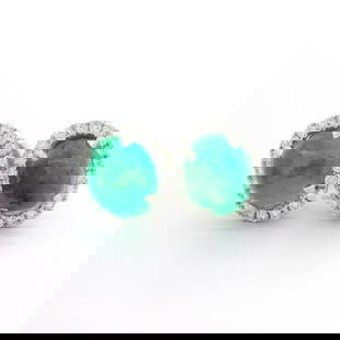 18k White Gold 3.07ctw Emerald Diamond Halo Stud Earrings: 18k White Gold 3.07ctw Emerald Diamond Halo Stud Earrings Elevate your elegance with these stunning 18k White Gold stud earrings featuring exquisite oval cabochon emeralds surrounded by a halo of dazz