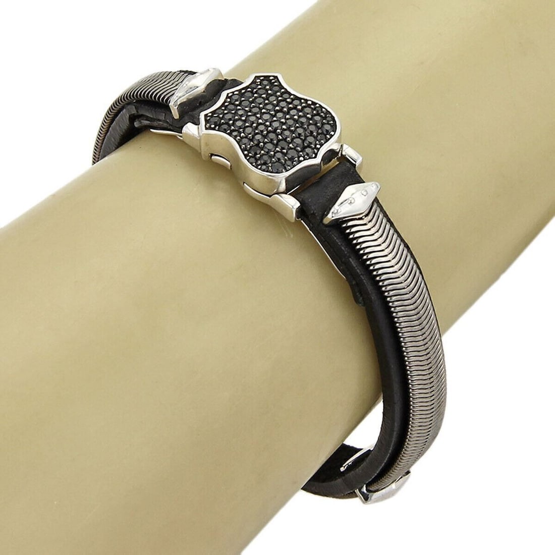 Stephen Webster High Wayman Sterling Silver Black Sapphire Leather Bracelet: Stephen Webster High Wayman Sterling Silver Black Sapphire Leather Bracelet The Stephen Webster High Wayman Sterling Black Sapphires & Leather Shield Bracelet is a striking statement piece that showca