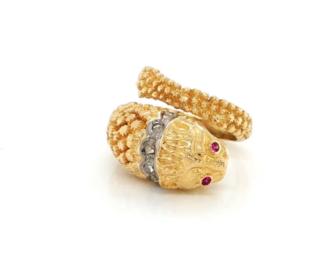 Exquisite 18k Yellow Gold Snake Bypass Ring with Ruby and Diamond Eyes: Exquisite 18k Yellow Gold Snake Bypass Ring with Ruby and Diamond Eyes This exquisite snake bypass ring is a stunning piece of fine jewelry, meticulously crafted in Greece from solid 18k yellow gold.