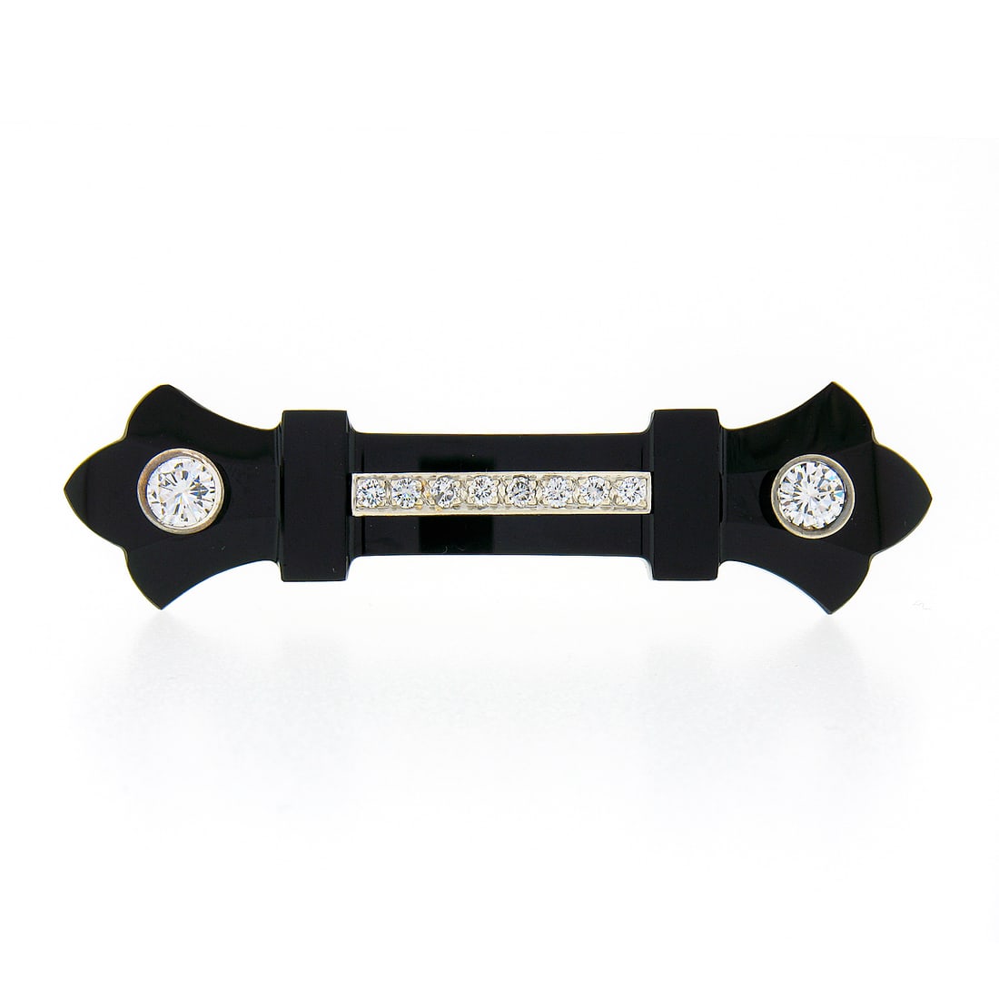 Vintage 14k Gold 1.14ctw Diamond Black Onyx Fleur De Lis Bar Brooch: Vintage 14k Gold 1.14ctw Diamond Black Onyx Fleur De Lis Bar Brooch This exquisite vintage brooch features a stunning carved black onyx stone, skillfully shaped into elegant fleur-de-lis ends. The pie