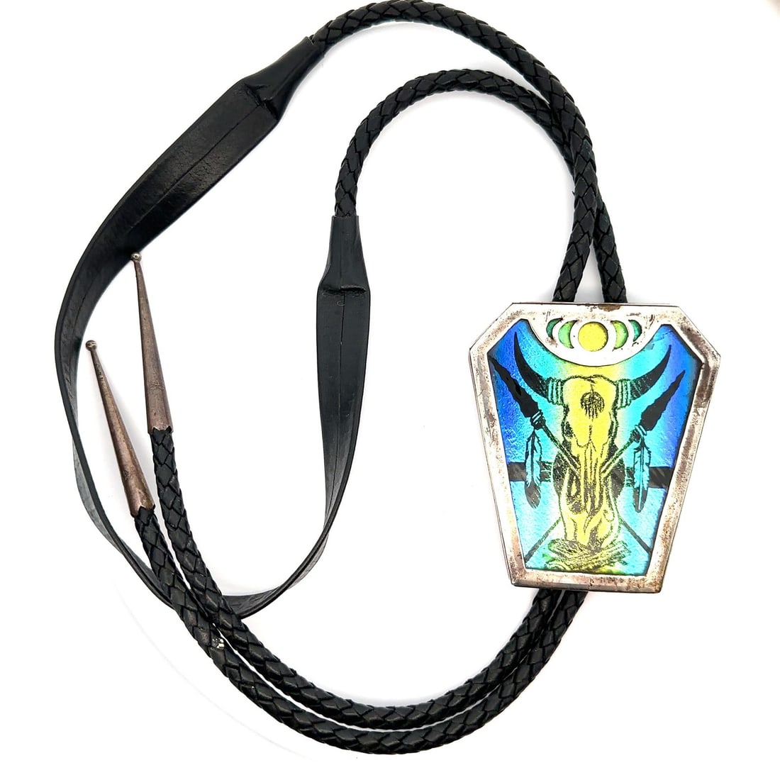 Native American Sterling Silver Buffalo Spirit Bolo Tie with Loon: Native American Sterling Silver Buffalo Spirit Bolo Tie with Loon This stunning bolo tie features a Native American-inspired design showcasing a Buffalo Spirit complemented by a Loon. Crafted from hig