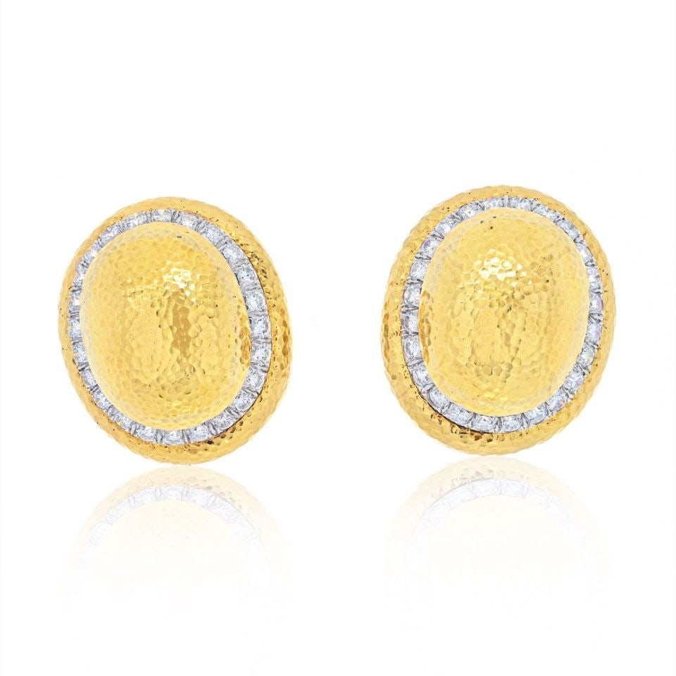 David Webb 18K Yellow Gold Hammered Dome Clip-On Earrings: David Webb 18K Yellow Gold Hammered Dome Clip-On Earrings Make a bold statement with these stunning David Webb earrings, crafted from a luxurious combination of 18K yellow gold and platinum. These lar