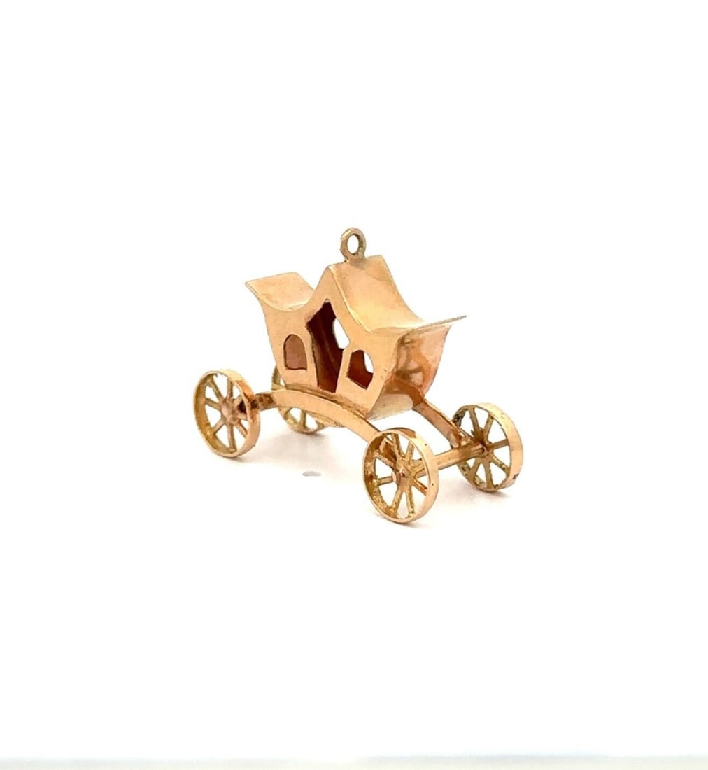 Vintage Handmade 17k Gold Coach Carriage Charm Pendant with Wheels: Vintage Handmade 17k Gold Coach Carriage Charm Pendant with Wheels Discover this exquisite Handmade Gold Coach Carriage Charm Pendant, elegantly crafted from 17-18k solid yellow gold. This vintage pie