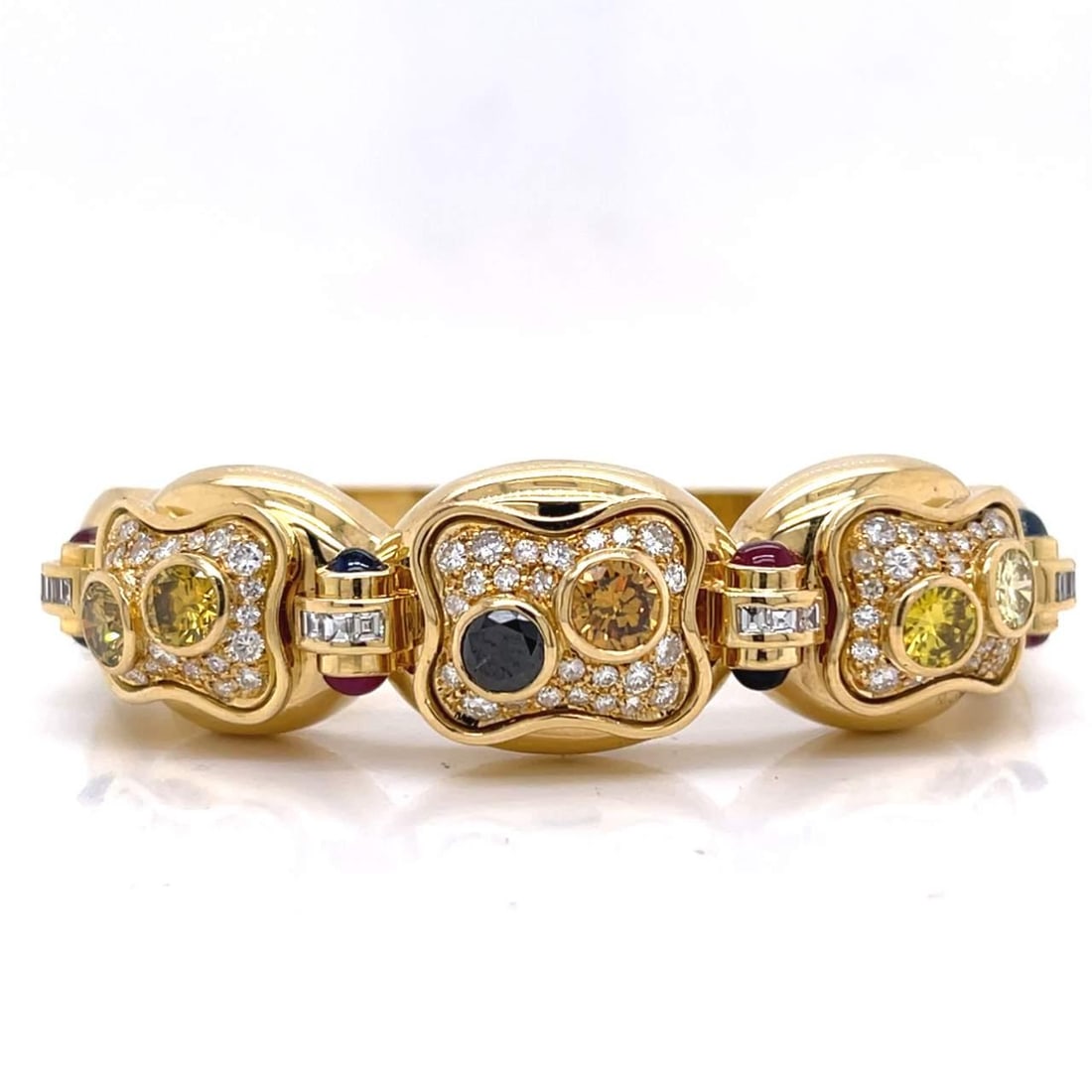 18K Yellow Gold Bangle Bracelet with 95 Diamonds: 18K Yellow Gold Bangle Bracelet with 95 Diamonds This stunning 18K Yellow Gold Bangle Bracelet showcases a luxurious design adorned with a total of 95 diamonds. It features 6 colored diamonds that wei