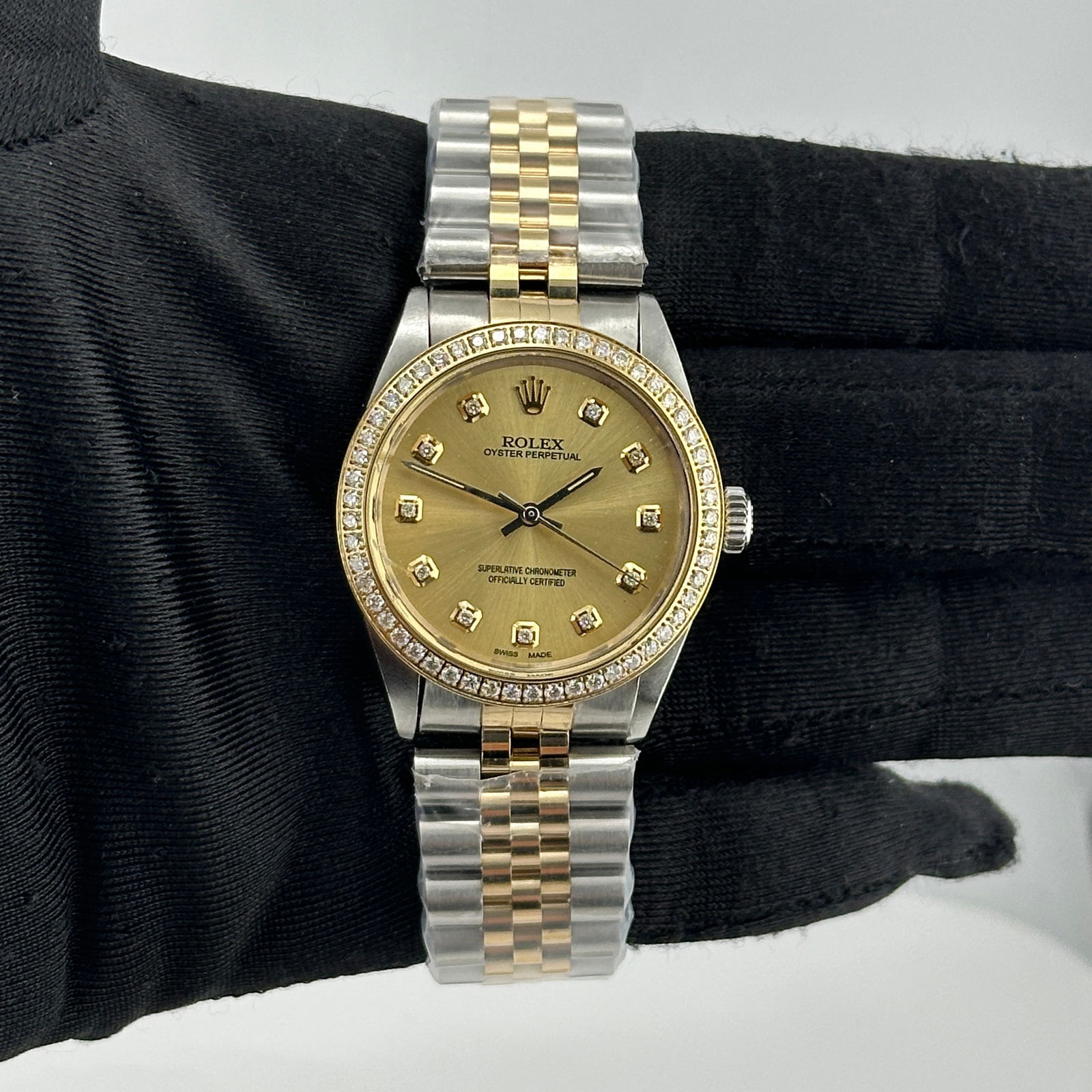 Rolex Oyster Perpetual 6426 Champagne Diamond Dial Jubilee Bracelet: Rolex Oyster Perpetual 6426 Champagne Diamond Dial Jubilee Bracelet Experience the elegance of the Rolex Oyster Perpetual featuring a stunning Aftermarket Champagne Diamond Dial and a luxurious Afterm