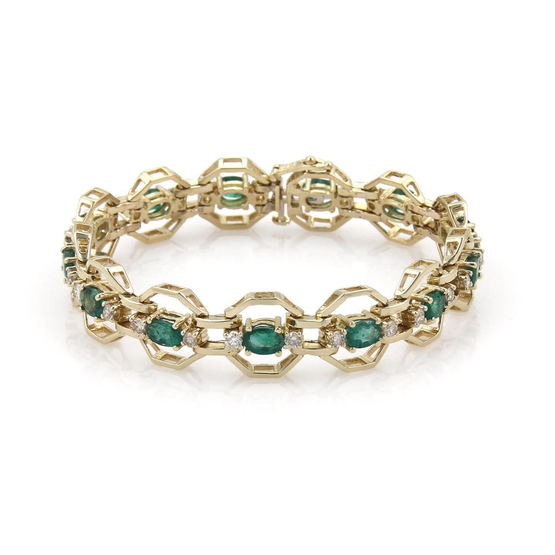 14k Yellow Gold Octagon Link Bracelet with 7ct Emerald and Diamond Accents: 14k Yellow Gold Octagon Link Bracelet with 7ct Emerald and Diamond Accents This stunning estate bracelet showcases a luxurious design crafted from 14k yellow gold with a polished finish. It features 1