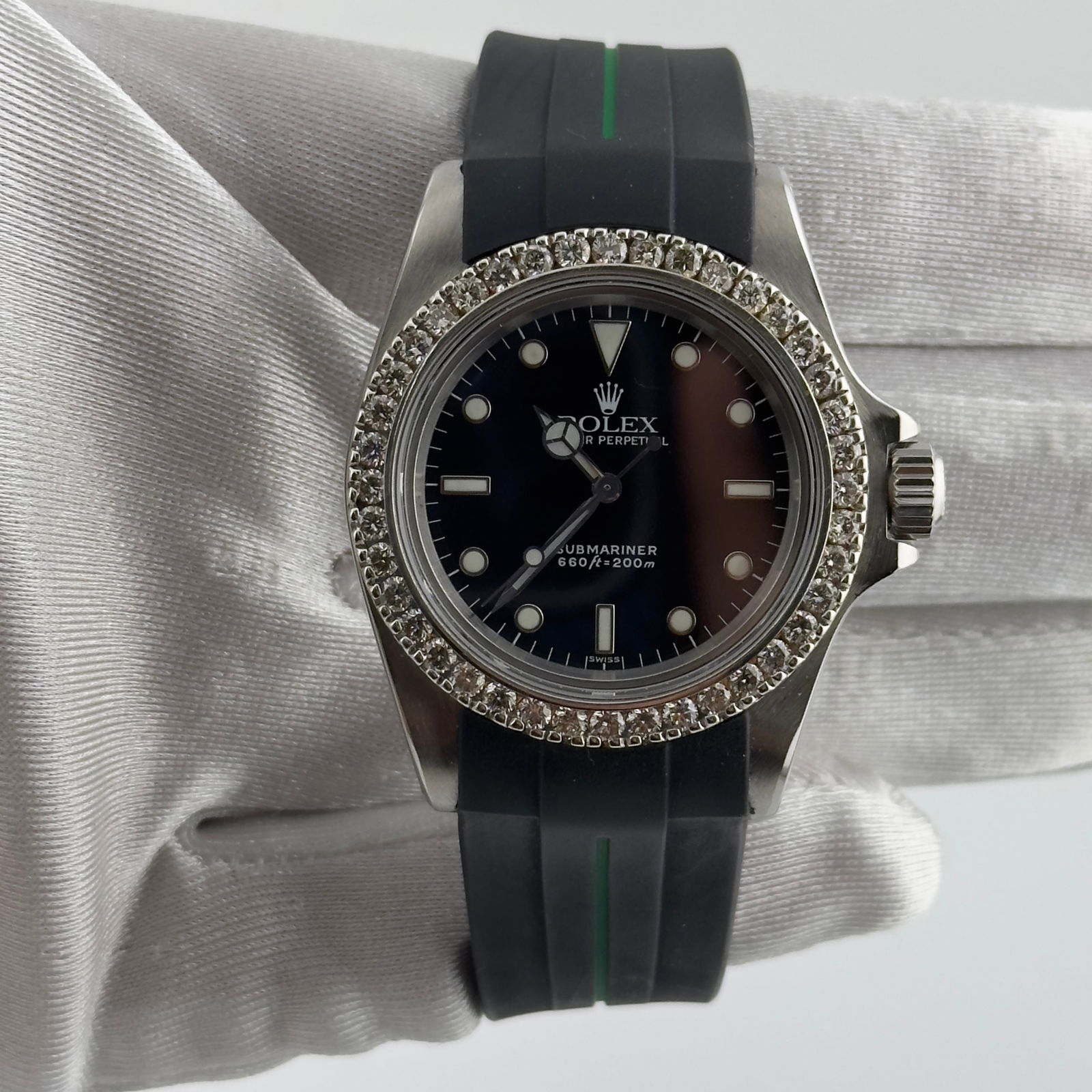Rolex Submariner 5513 Black Dial Diamond Prong Bezel Rubber Bracelet: Rolex Submariner 5513 Black Dial Diamond Prong Bezel Rubber Bracelet Experience luxury and precision with this Rolex Submariner, featuring a striking black dial and a diamond prong bezel. This timepie