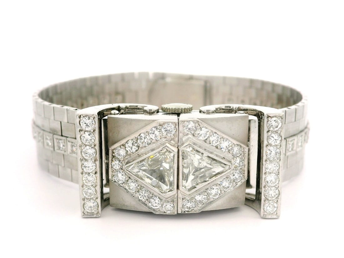 Hamilton Antique Platinum Gold Diamond Hidden Watch Bracelet 3.9ctw: Hamilton Antique Platinum Gold Diamond Hidden Watch Bracelet 3.9ctw This exquisite Antique Hamilton watch combines platinum and gold craftsmanship with the stunning brilliance of natural diamonds. Fea