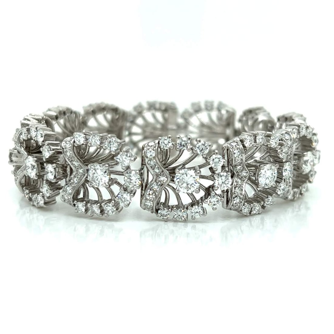 Vintage 1950's 18K White Gold 16 Ct Diamond Bracelet: Vintage 1950's 18K White Gold 16 Ct Diamond Bracelet This stunning 1950's bracelet is crafted from 18K white gold and features a total of 16.00 carats of exquisite diamonds. The piece weighs 48.0 gram