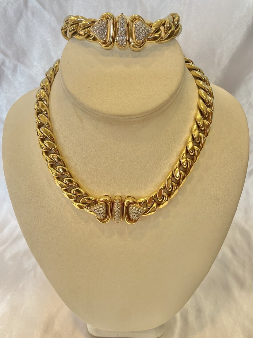 Italian 18K Gold Diamond Necklace and Bracelet Set 128.70g Cuban Style: Italian 18K Gold Diamond Necklace and Bracelet Set 128.70g Cuban Style Discover this exquisite Italian 18K yellow gold diamond jewelry set, featuring a stunning necklace and bracelet. Weighing a total