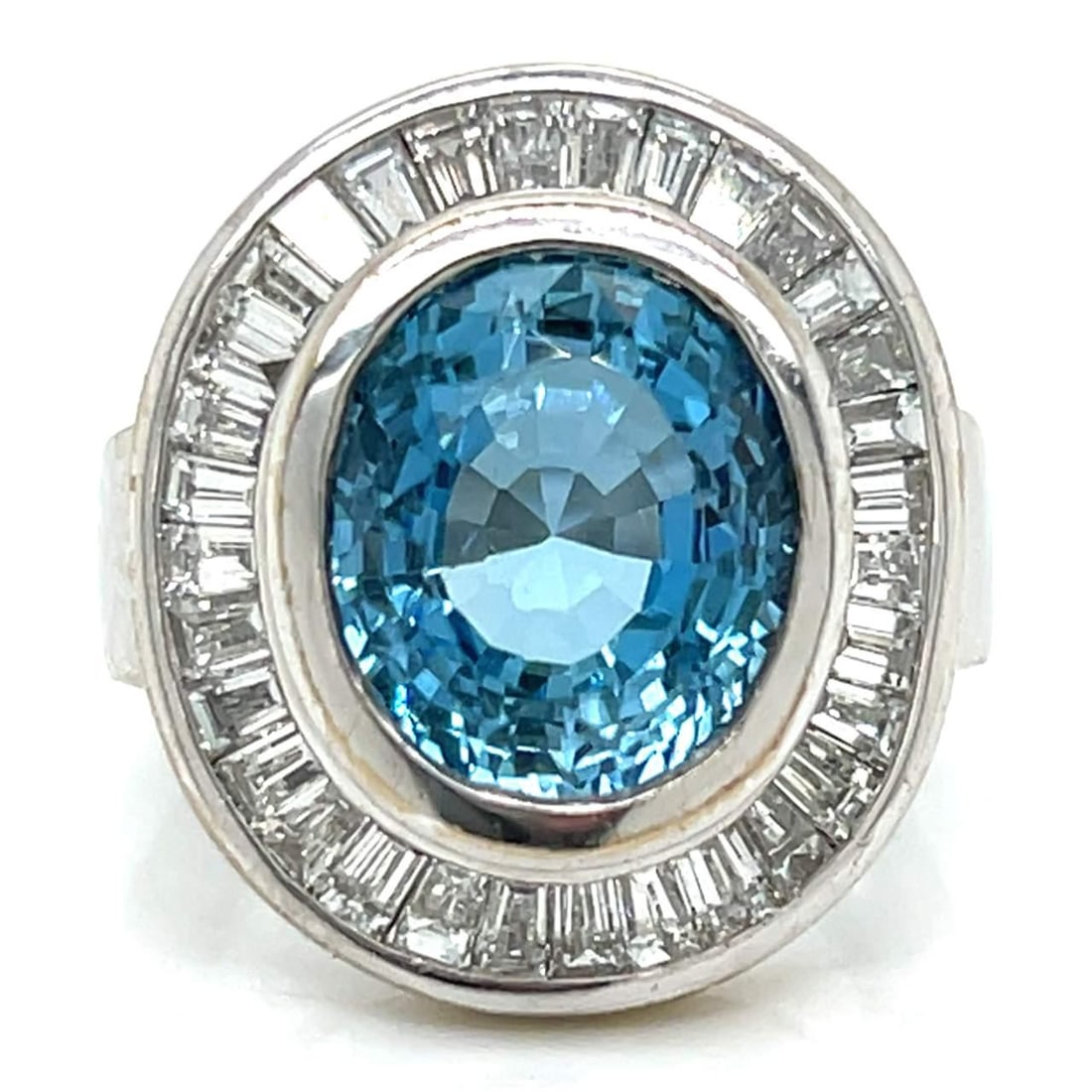 18K White Gold 4.34 Ct Aquamarine Diamond Ring: 18K White Gold 4.34 Ct Aquamarine Diamond Ring This exquisite 18K White Gold Aquamarine and Diamond Ring features a stunning 4.34 Ct. aquamarine at its center, elegantly surrounded by 33 shimmering di