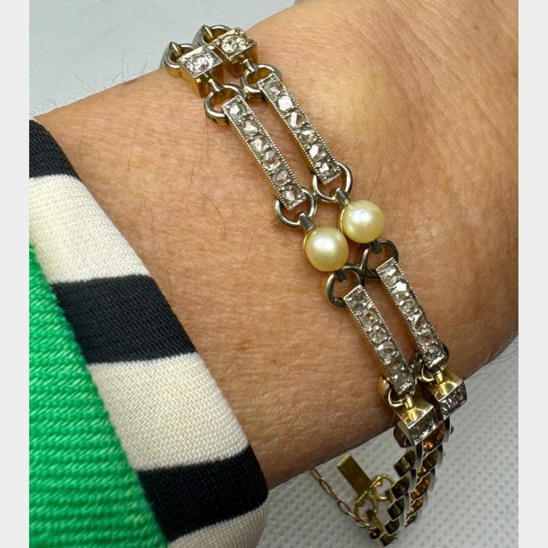 Antique 18K Gold Platinum Pearl Diamond Bracelet 28 Rose-cut Diamonds: Antique 18K Gold Platinum Pearl Diamond Bracelet 28 Rose-cut Diamonds This exquisite Antique Bracelet features a stunning combination of natural pearls and diamonds, crafted in luxurious 18K gold and