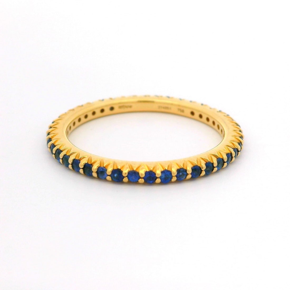 Ritani 18k Gold Royal Blue Sapphire Eternity Band Ring 10: Ritani 18k Gold Royal Blue Sapphire Eternity Band Ring 10 This exquisite eternity band ring by Ritani features a stunning array of 42 natural genuine sapphires, each masterfully cut in a round brillia