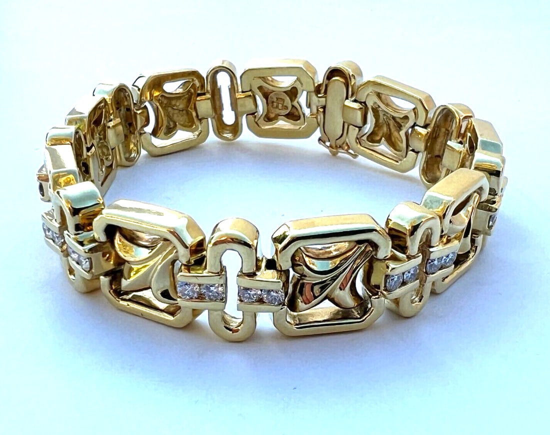 French 18K Gold Diamond Bracelet 2.2 ct Signed Hallmarked: French 18K Gold Diamond Bracelet 2.2 ct Signed Hallmarked Introducing a stunning French 18K yellow gold diamond bracelet that showcases exquisite craftsmanship and design. This chain-style bracelet fe
