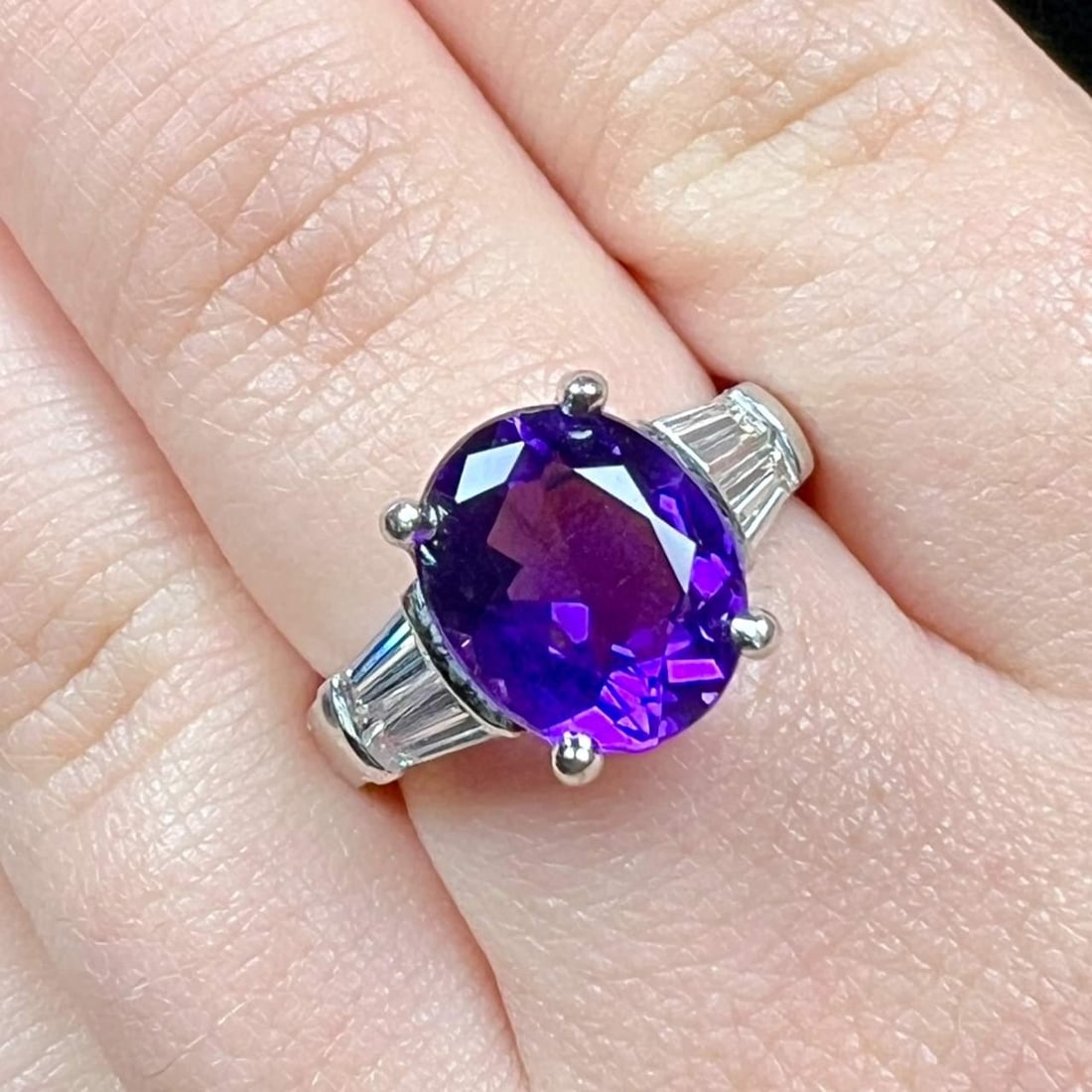 Stunning Platinum Amethyst Ring with 1.50 Ct Diamonds: Stunning Platinum Amethyst Ring with 1.50 Ct Diamonds This exquisite Platinum Amethyst & Diamond Ring features a stunning approximate 4.00 Ct Amethyst at its center, surrounded by approximately 1.50 C