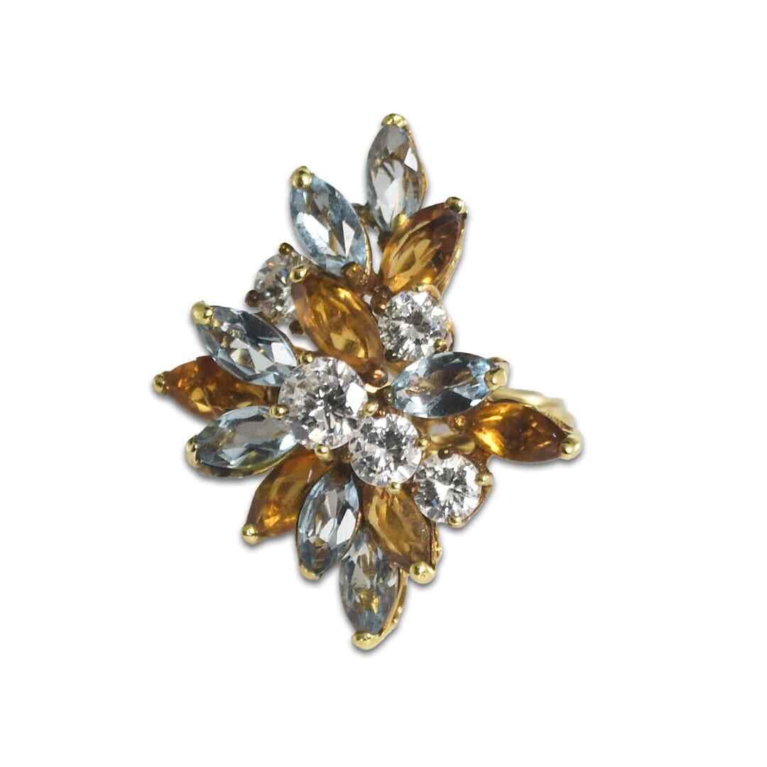 18K Yellow Gold Aquamarine Diamond Cocktail Ring with Golden Beryl: 18K Yellow Gold Aquamarine Diamond Cocktail Ring with Golden Beryl This exquisite cocktail ring features a stunning blend of 18K yellow gold, showcasing an array of natural gemstones. The centerpiece