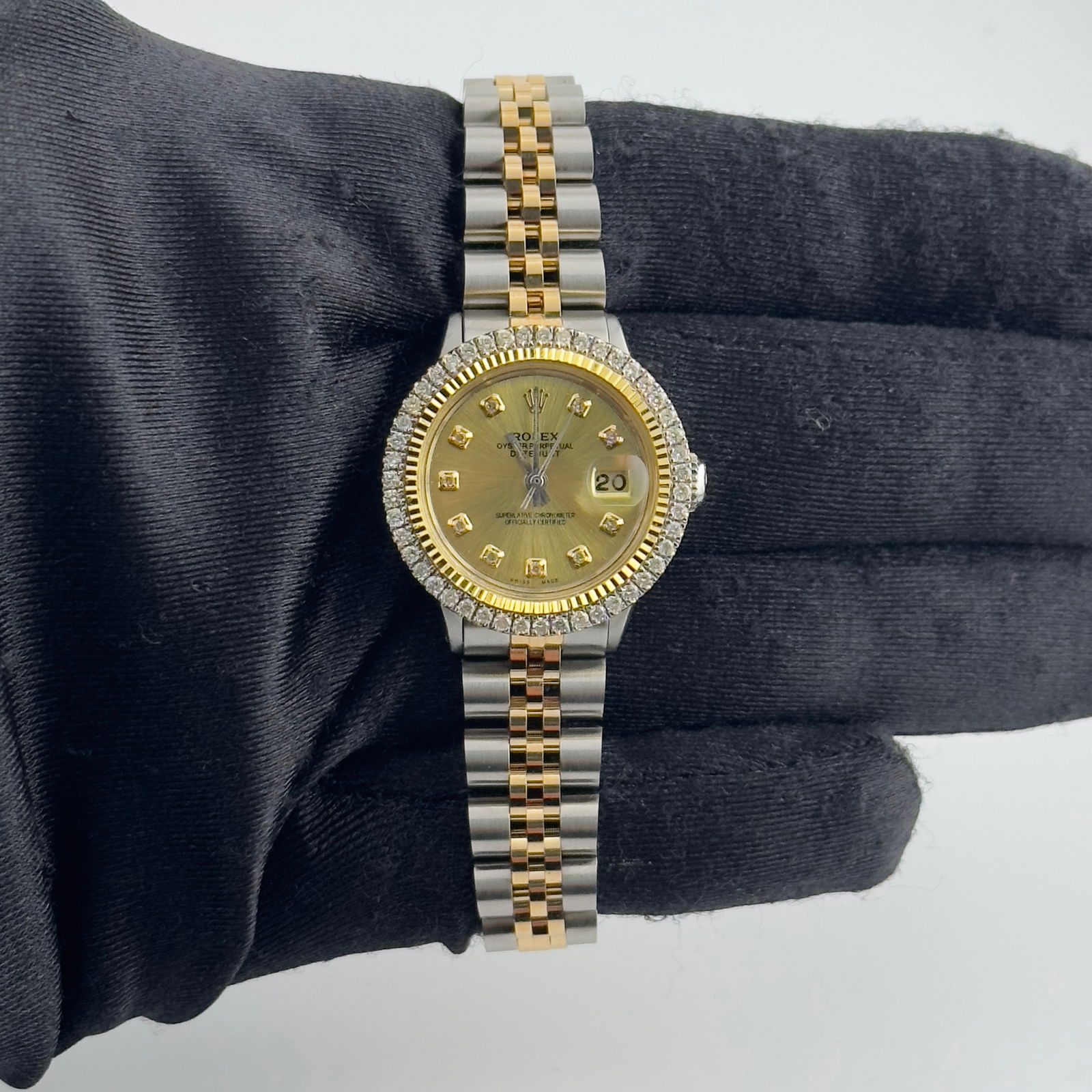 Rolex Datejust 6517 Ladies Watch Champagne Diamond Dial Jubilee Bracelet: Rolex Datejust 6517 Ladies Watch Champagne Diamond Dial Jubilee Bracelet This exquisite ladies' Rolex Datejust features a stunning Aftermarket Champagne Diamond dial, accented by a prong-plated diamon