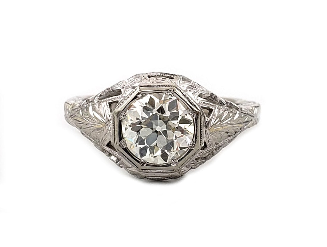 Stunning Art Deco 1ct European Cut Diamond Ring in 14k White Gold: Stunning Art Deco 1ct European Cut Diamond Ring in 14k White Gold This exquisite Art Deco solitaire ring features a stunning 1 carat European cut diamond set in 14k white gold. The diamond is elegantl