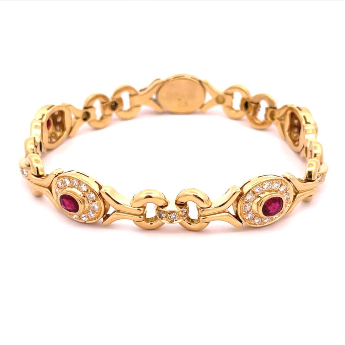 Elegant 18k Yellow Gold Ruby Diamond Fancy Link Bracelet 7.5": Elegant 18k Yellow Gold Ruby Diamond Fancy Link Bracelet 7.5" This exquisite bracelet showcases a beautiful fancy link design, expertly crafted from 18k yellow gold with a polished finish. It features