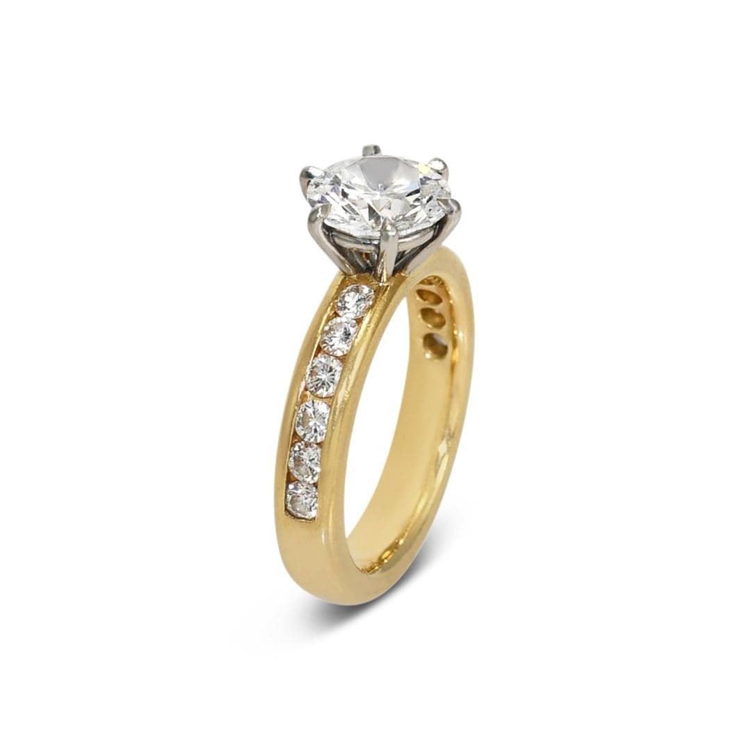 18K Yellow Gold GIA Certified 1.78ct Diamond Ring Size 6: 18K Yellow Gold GIA Certified 1.78ct Diamond Ring Size 6 This exquisite ring showcases a stunning 1.78ct round brilliant cut diamond at its center, boasting a color grade of E and clarity grade of VS1