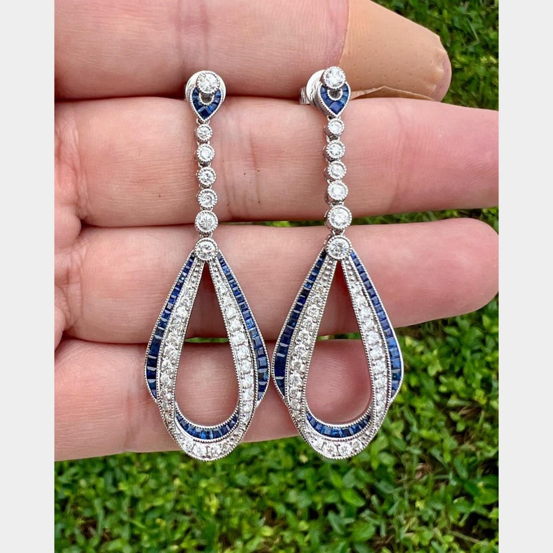14K White Gold Sapphire Diamond Earrings 1.62 Ct Diamonds 1.30 Ct Sapphires: 14K White Gold Sapphire Diamond Earrings 1.62 Ct Diamonds 1.30 Ct Sapphires These stunning earrings are crafted from 14K white gold and feature a captivating combination of sapphires and diamonds. Wei