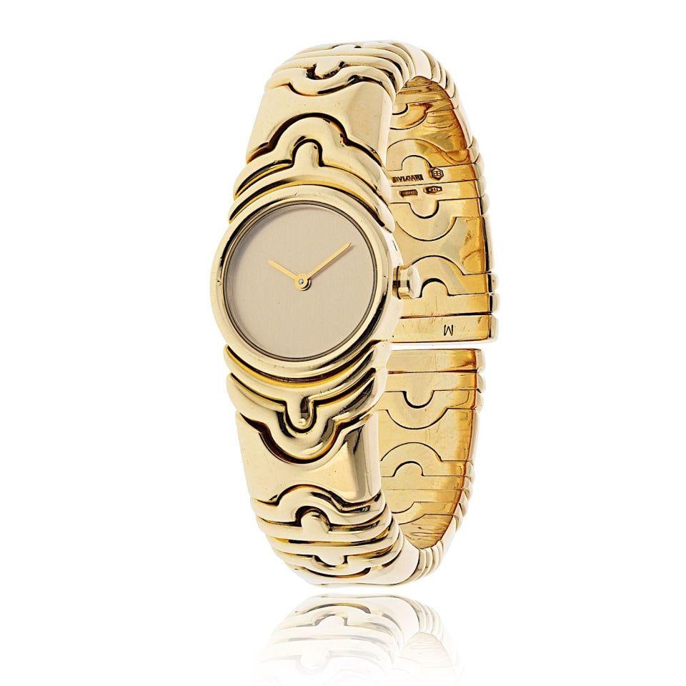 Bvlgari Parentesi 18K Yellow Gold Vintage Watch BJ 01 H54486: Bvlgari Parentesi 18K Yellow Gold Vintage Watch BJ 01 H54486 This exquisite Bvlgari Parentesi watch is crafted from 18K yellow gold, offering a luxurious vintage appeal. Weighing 96.4 grams, it showca