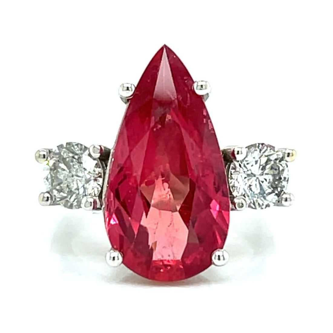 GIA Certified 10.00 Ct Ruby & Diamond Ring in 18K White Gold: GIA Certified 10.00 Ct Ruby & Diamond Ring in 18K White Gold This stunning 18K white gold ring features a breathtaking GIA certified heated Mozambique ruby, weighing approximately 10.00 ct, showcasing