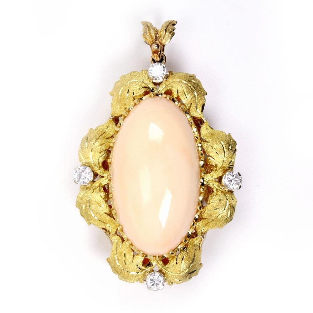 Large 18k Gold Diamond Coral Leaf Pendant Vintage Estate Jewelry: Large 18k Gold Diamond Coral Leaf Pendant Vintage Estate Jewelry This stunning vintage pendant showcases a unique leaf design, expertly crafted from 18k yellow gold. It features a large oval-shaped an