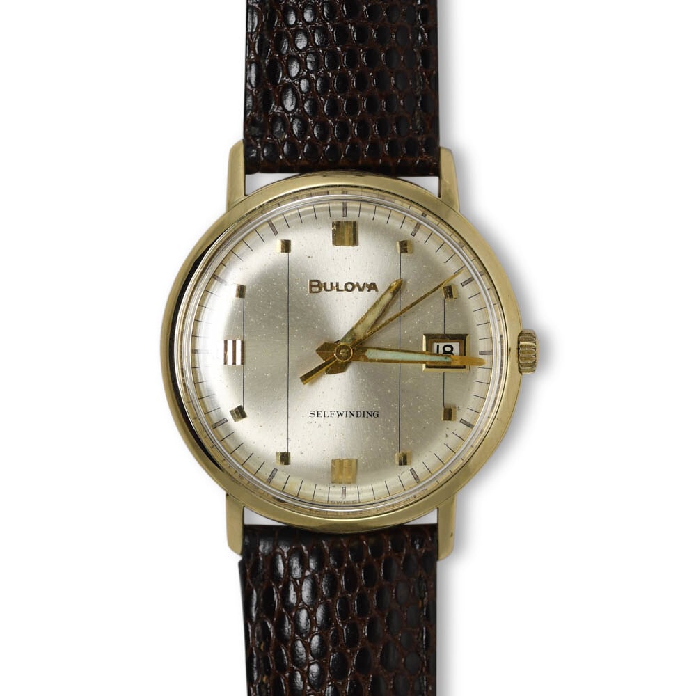 Men's Vintage Bulova 14K Yellow Gold Automatic Wristwatch: Men's Vintage Bulova 14K Yellow Gold Automatic Wristwatch This stunning vintage Bulova wristwatch features a luxurious 14K yellow gold case and a precision 17 jewel automatic movement. Designed for me