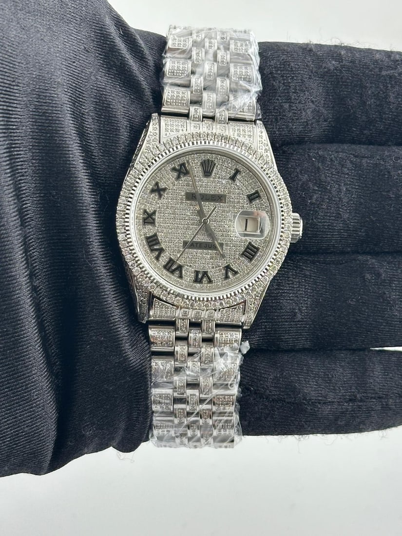 Rolex Datejust 16030 Iced Out Roman Dial Prong Diamond Bezel After Market Jubilee: Rolex Datejust 16030 Iced Out Roman Dial Prong Diamond Bezel After Market Jubilee This stunning Rolex Datejust watch features an iced-out Roman dial, set within a prong diamond bezel. Designed for men