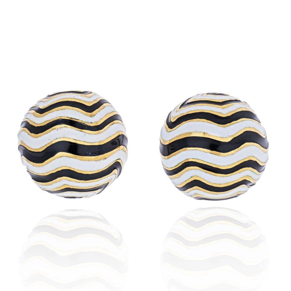 David Webb Platinum 18K Yellow Gold Zebra Enamel Clip-On Earrings: David Webb Platinum 18K Yellow Gold Zebra Enamel Clip-On Earrings Elevate your jewelry collection with these exquisite David Webb earrings, featuring a stunning zebra pattern in vibrant enamel. Crafte