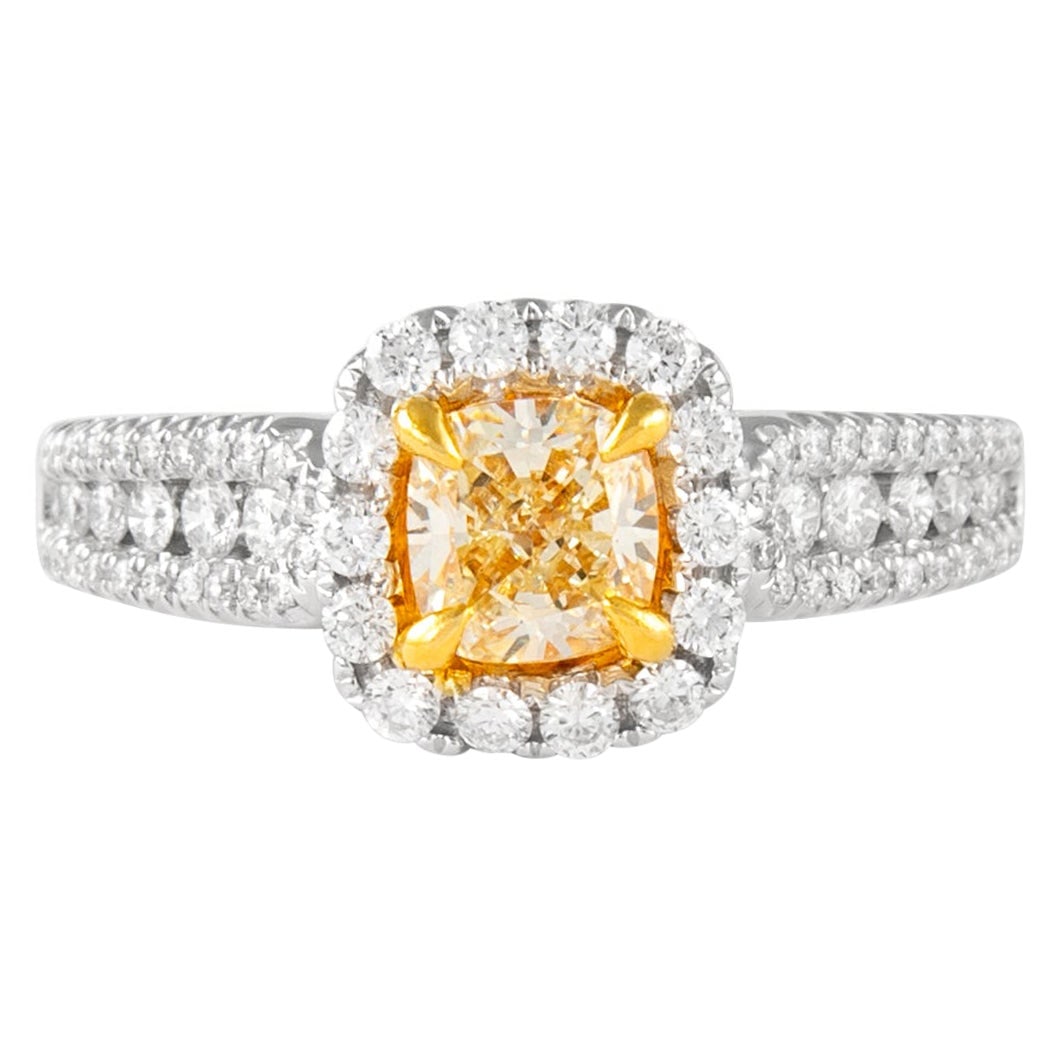 1.47ct Fancy Yellow Cushion Diamond Ring 18k EGL Certified: 1.47ct Fancy Yellow Cushion Diamond Ring 18k EGL Certified This exquisite ring showcases a stunning EGL certified 1.47 carat Fancy Yellow cushion cut diamond with VS1 clarity, elegantly set in a conte