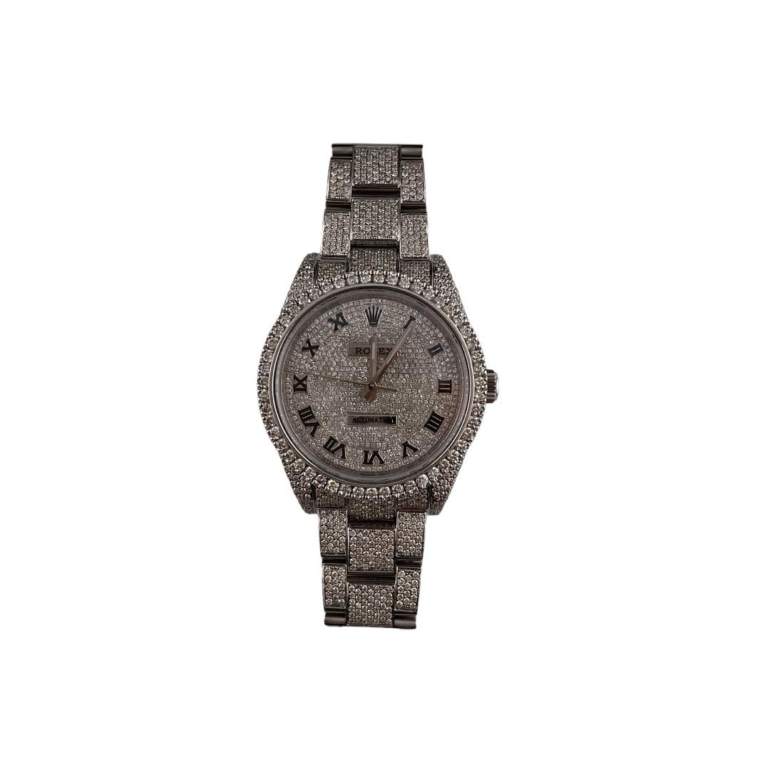 Rolex Oyster Perpetual 39mm Diamond Dial Ref 114300 Luxury Watch: Rolex Oyster Perpetual 39mm Diamond Dial Ref 114300 Luxury Watch This exquisite Rolex Oyster Perpetual features a stunning diamond dial that elevates its classic design. The watch is part of the Oyste